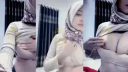 Nona Berjilbab Cantik Yang Menggoda Mengeluarkan Tetek Montoknya